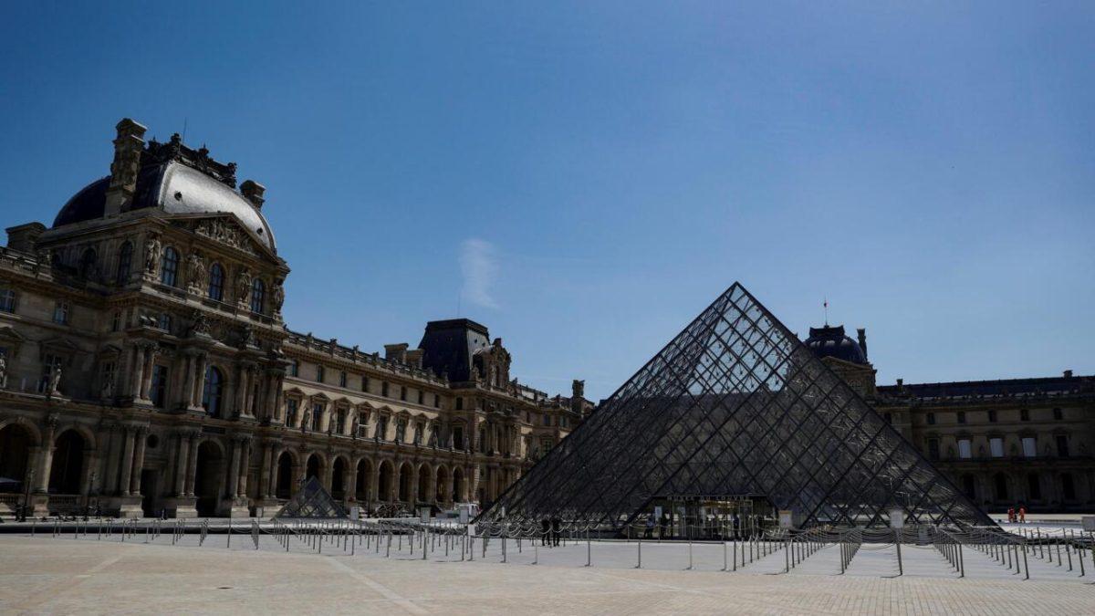 A picture taken on June 23, 2020 shows the Louvre pyramid by Chinese architect Ieoh Ming Pei, the entrance to the Louvre Museum in Paris. - The Louvre museum will reopen its doors on July 6, 2020, after months of closure due to lockdown measures linked to the COVID-19 pandemic, caused by the novel coronavirus. The coronavirus crisis has already caused "more than 40 million euros in losses" at the Louvre, announced its president and director Jean-Luc Martinez, who advocates a revival through "cultural democratization" and is preparing a "transformation plan" for the upcoming Olympic Games in 2024. (Photo by THOMAS SAMSON / AFP) / RESTRICTED TO EDITORIAL USE - MANDATORY MENTION OF THE ARTIST UPON PUBLICATION - TO ILLUSTRATE THE EVENT AS SPECIFIED IN THE CAPTION
