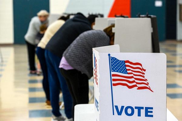 Voters fill out their ballots November 08, 2022, at the  Manchester High School polling station. Photograph by Mark Mirko/Connecticut Public